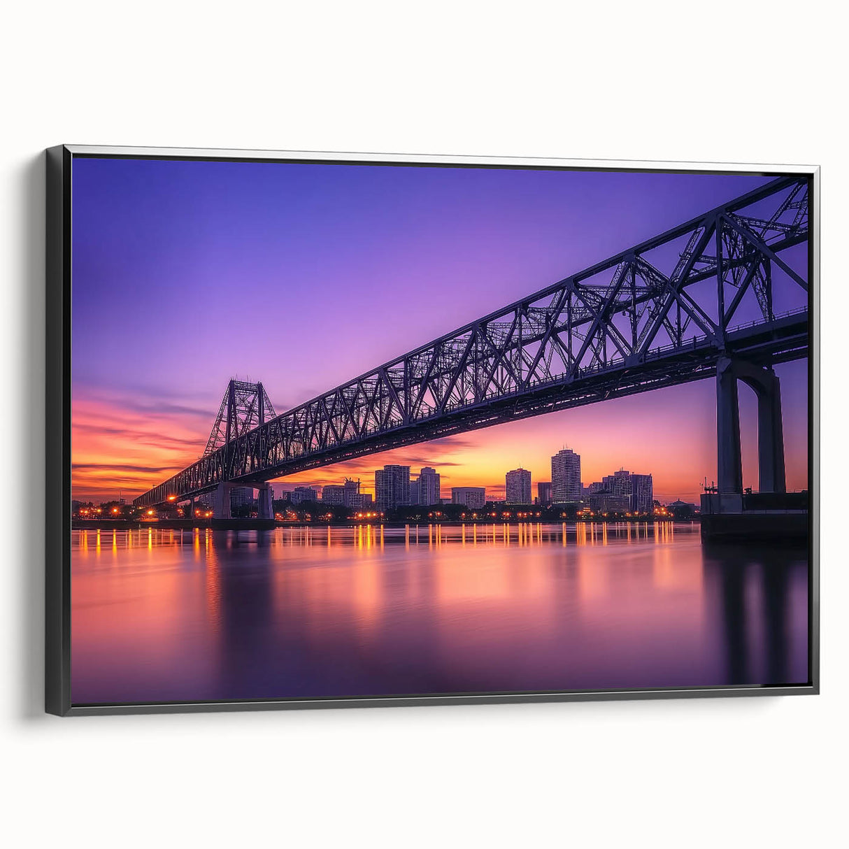 Framed canvas artwork depicting a serene landscape bridge view, showcasing lush greenery and tranquil water reflections, presented in a sleek black frame.