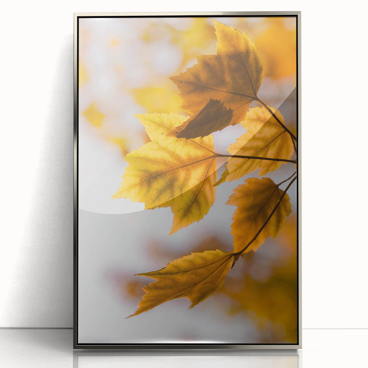 Mid-century modernist art depicting an abstract fall scene in warm orange and brown tones, framed in silver acrylic.