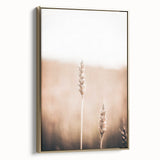 Framed canvas depicting a vintage landscape painting in muted earth tones, ideal for bedroom wall decor.
