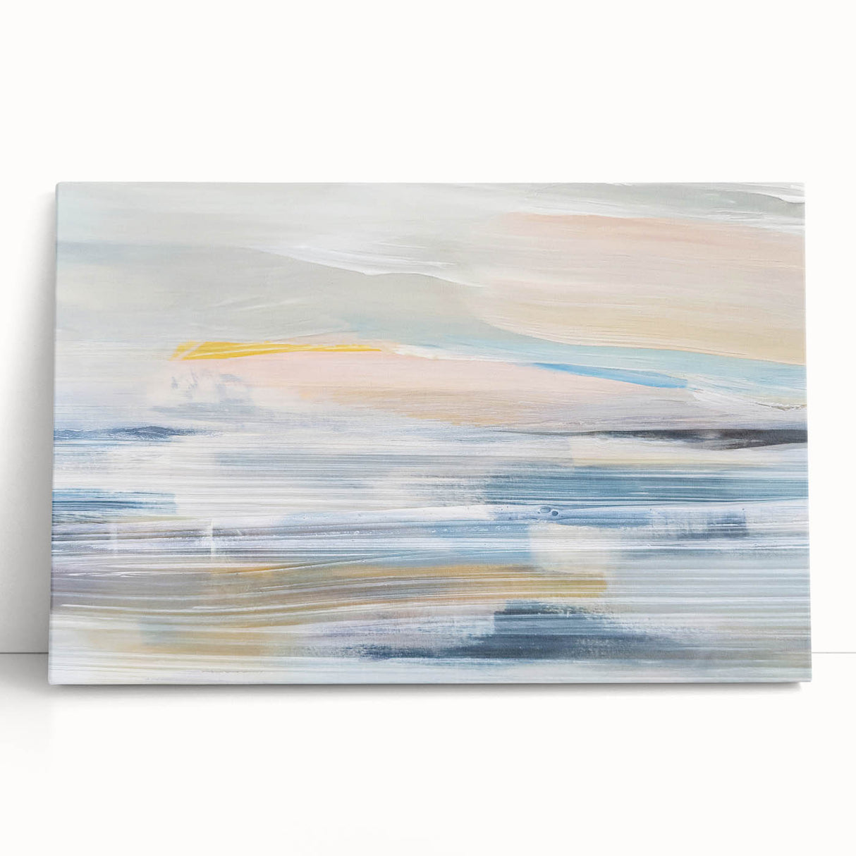 Abstract landscape wall art on stretched canvas, showcasing vibrant hues of blue and orange with a textured finish, leaning against a neutral wall, ideal for modern decor.