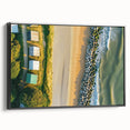 Framed canvas artwork depicting a serene beach landscape, showcasing vibrant colors and intricate details, presented in a sleek black frame for stylish home decor.