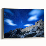 Framed canvas artwork showcasing dramatic cliffs and landscapes, featuring a sleek silver frame and side view, perfect for modern home decor.
