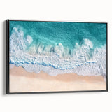 Framed canvas print showcasing a serene beach landscape with vibrant colors and intricate details, presented in a sleek black frame from a side view. Ideal for home decor.