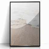 Large abstract wall art print featuring swirling blue and orange hues, framed in black acrylic.