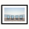Black frame showcasing a landscape beach print with a white mat, perfect for coastal decor. Ideal for enhancing living spaces with a serene ocean view.