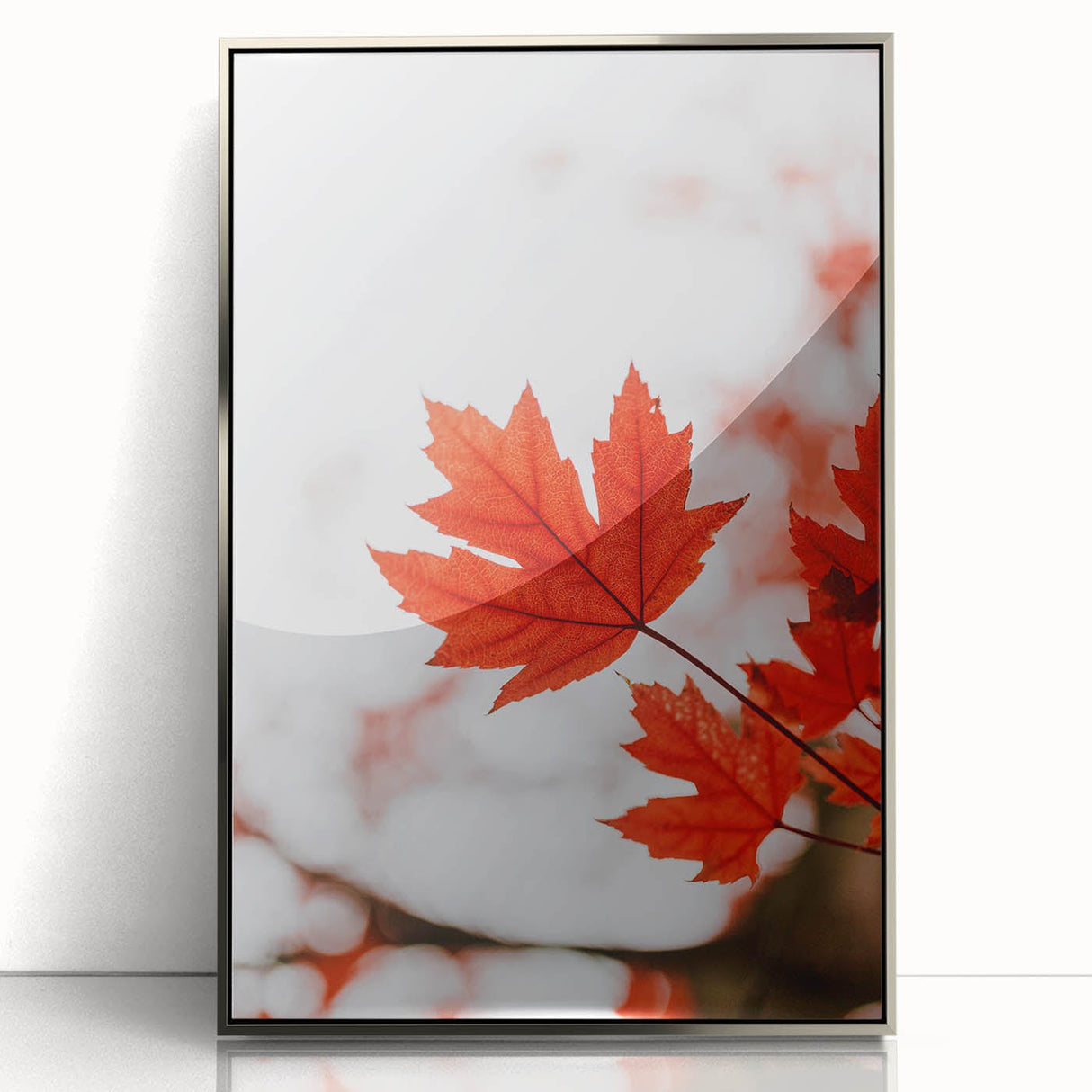 Mid-century modernist art depicting an abstract fall landscape in warm orange tones, framed in silver acrylic.