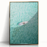 Large art print of a mid-century modernist summer scene in vibrant colors on a gold-framed acrylic.