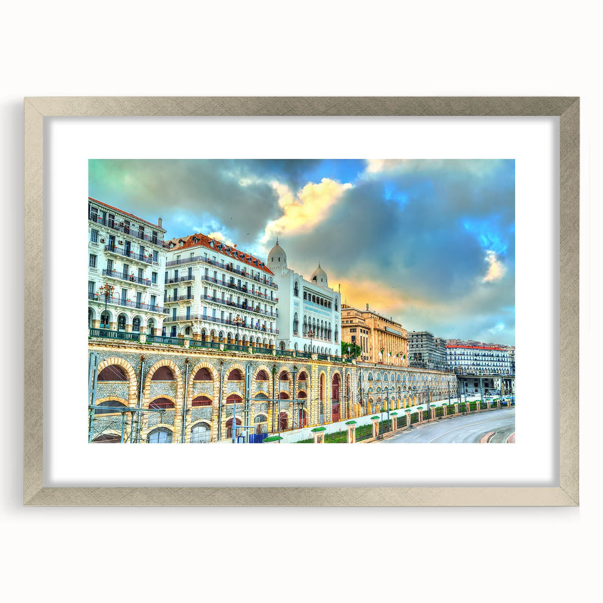 Abstract art print of Algerian scenery in muted earth tones on a framed silver mat.