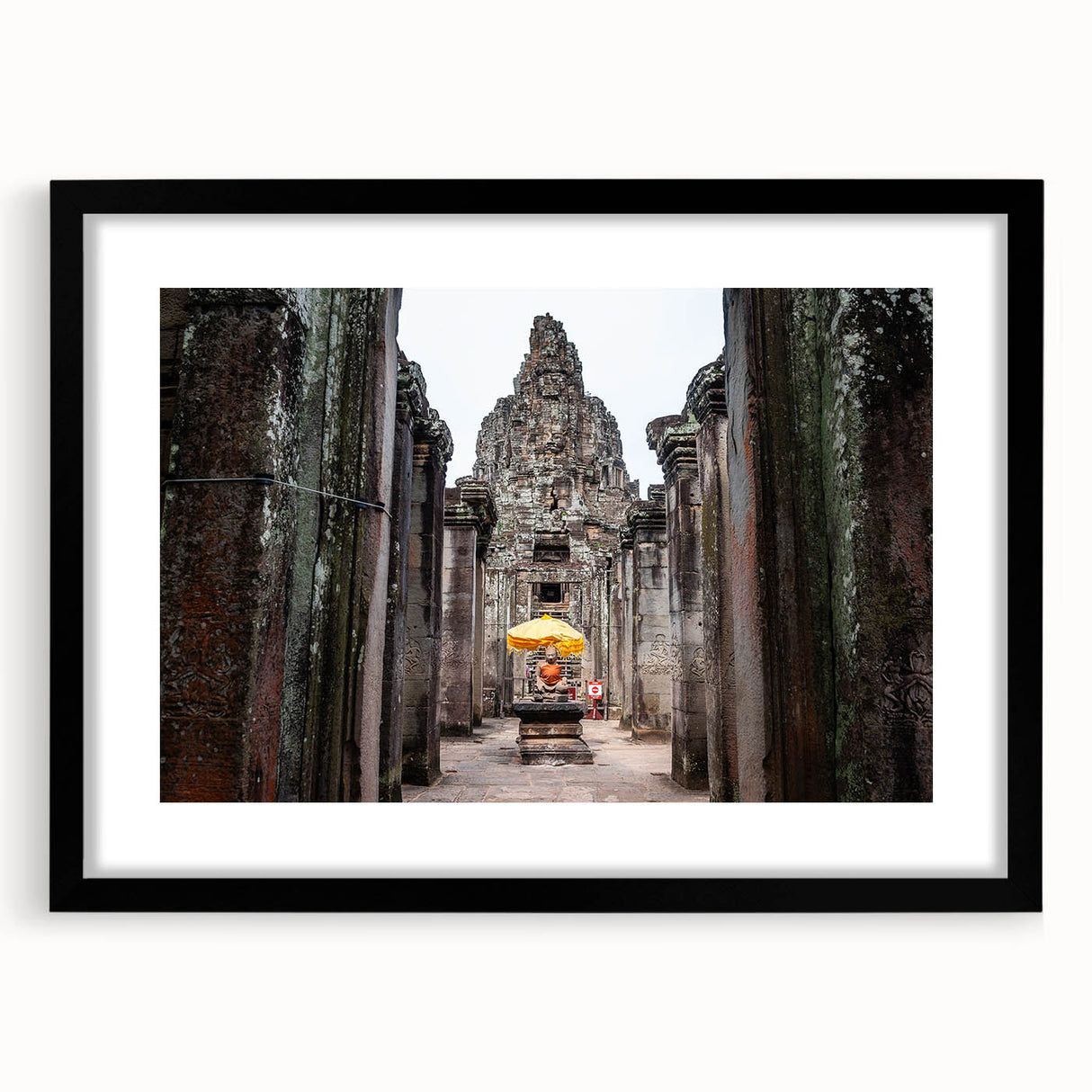 Extra large, textured abstract art print of a colorful Cambodian scenery on a black framed canvas.