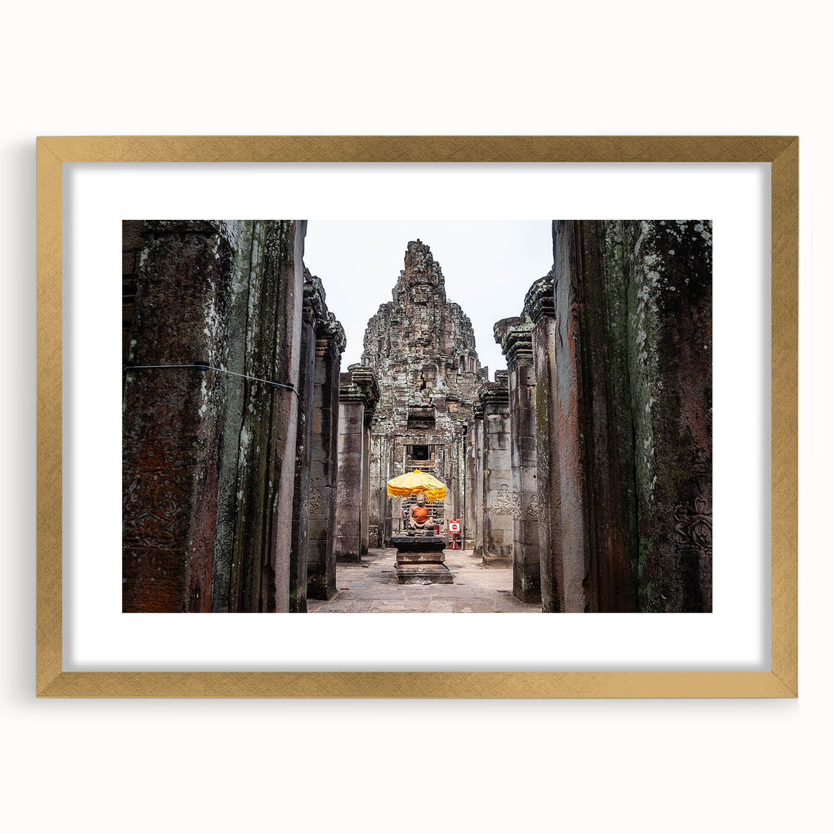 Extra large abstract art print of a Cambodian landscape, featuring textured gold and green hues on a framed canvas.