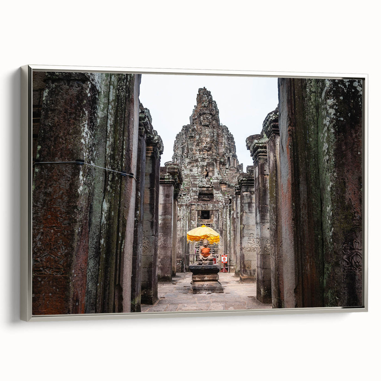 Framed canvas depicting a vintage-style landscape art painting of Cambodian scenery in vibrant colors.