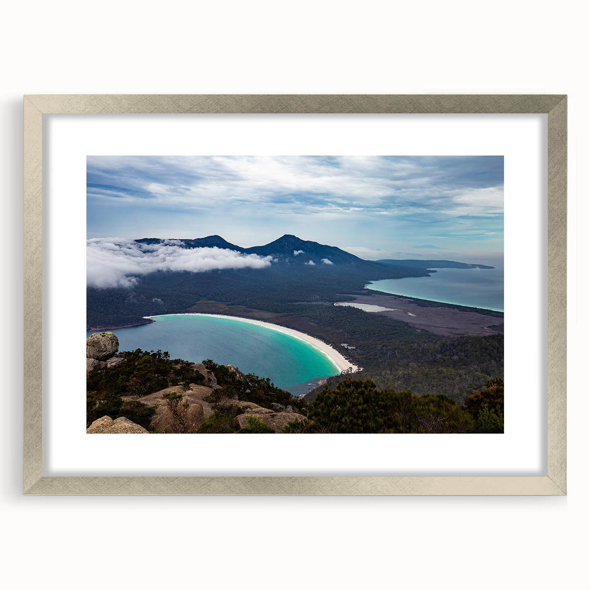 Extra large abstract art print of textured Tasmania scenery in muted earth tones, framed in silver.