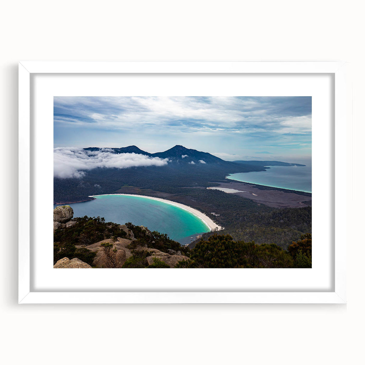 Textured art depicting abstract scenery of Tasmania in muted earth tones on a framed white mat, suitable for bedroom decor.