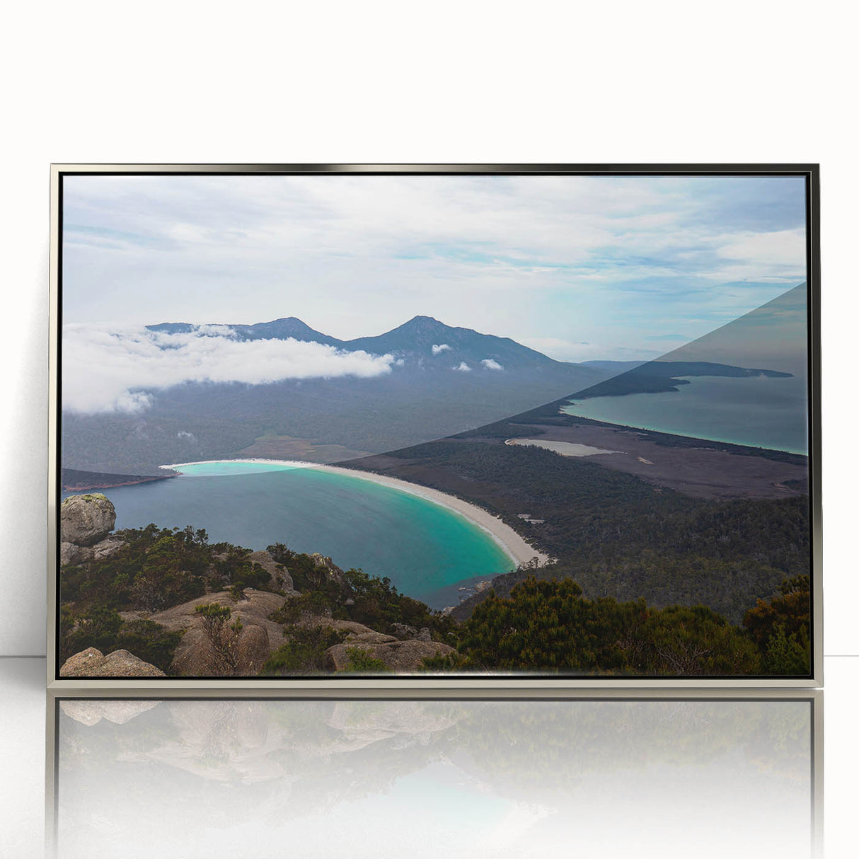 Framed acrylic print of a Tasmanian landscape in art deco style, featuring muted green and blue tones.