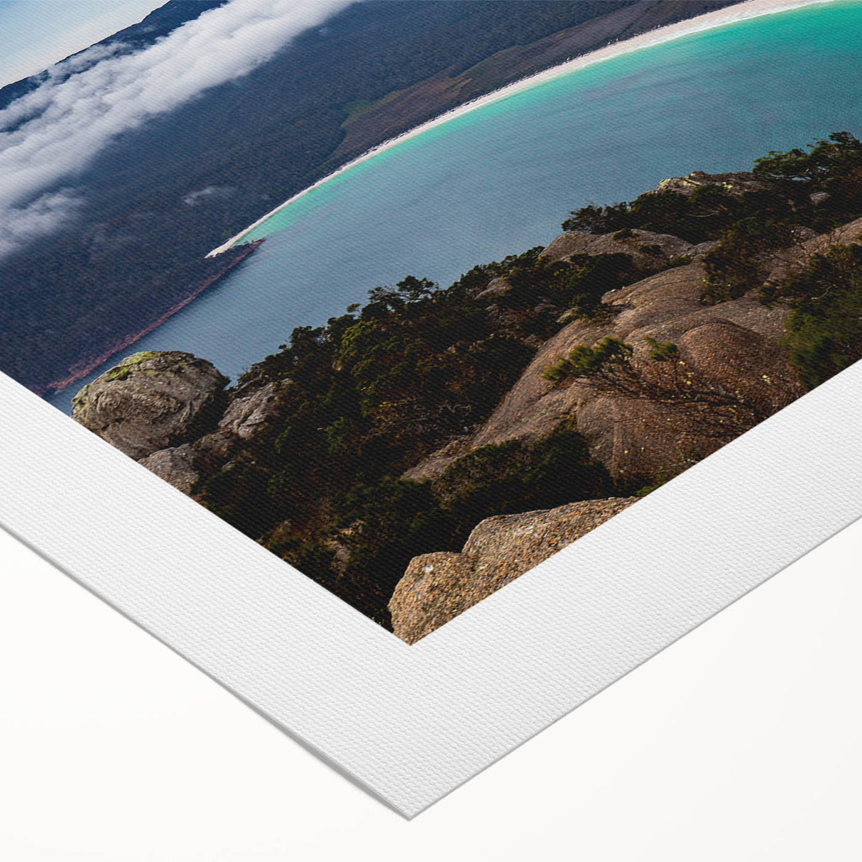 Art deco poster of Tasmania scenery in muted green and blue tones on rolled canvas, suitable for dining room wall art.