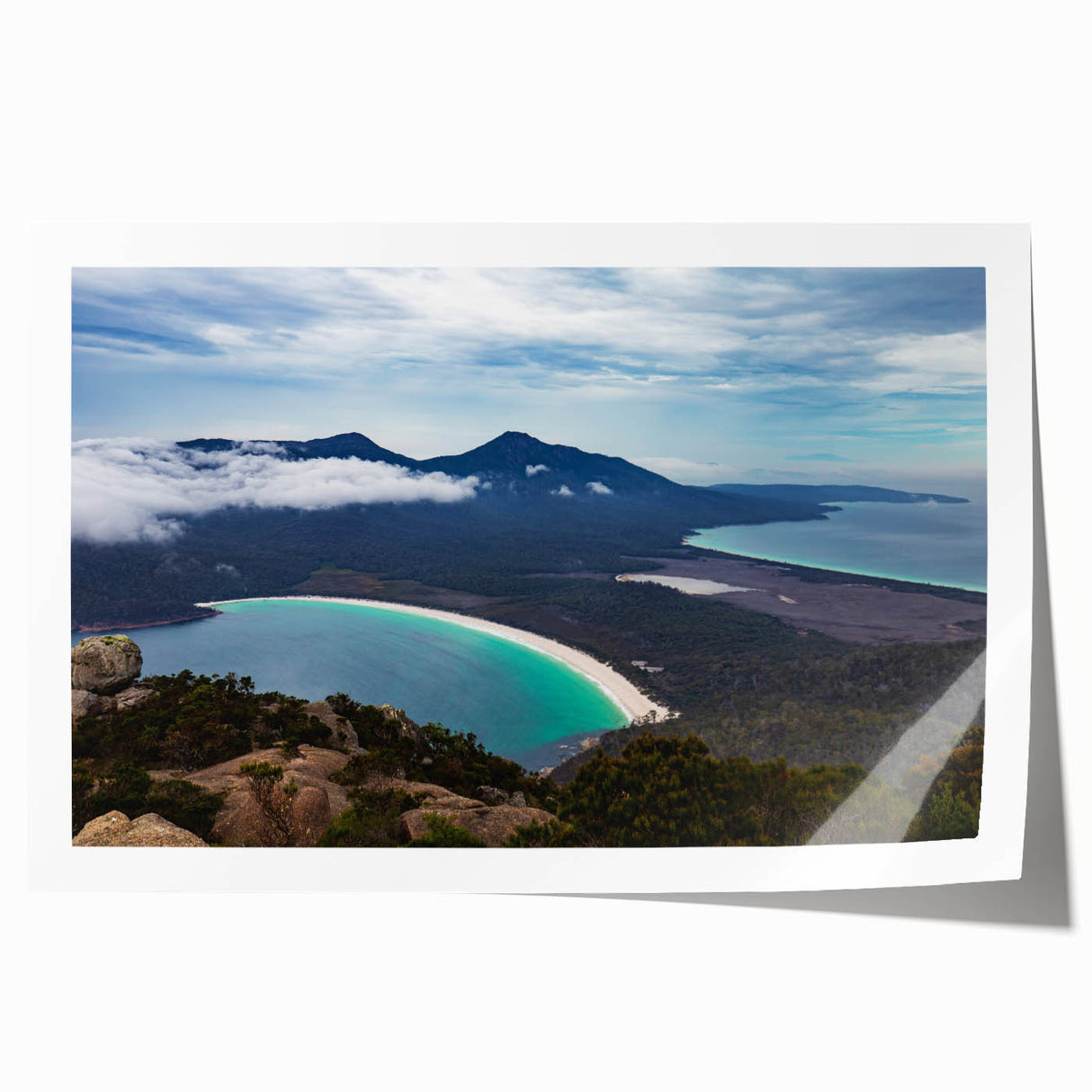 Extra large rolled print of a Tasmanian landscape with soft floral elements in muted colors, ideal for dining room wall art.
