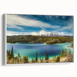 Vintage poster art of Yukon scenery on a framed canvas, featuring vibrant, colorful art and black accents.
