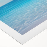 Art deco poster of Caribbean Aruba scenery on rolled canvas, featuring vibrant blue and green tones.