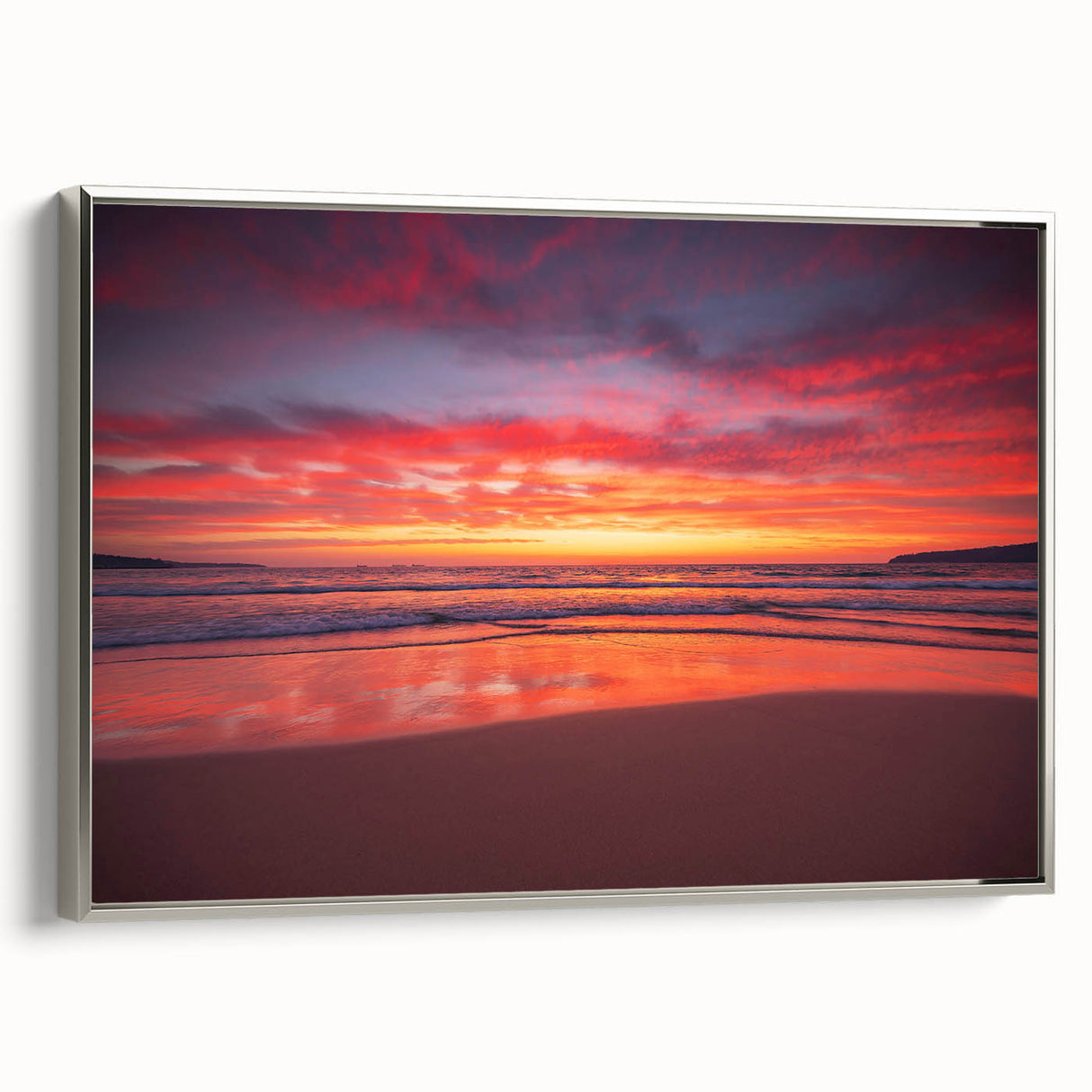 Framed canvas featuring a vintage-style landscape painting of the Caribbean, with muted blues and greens.
