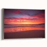 Framed canvas featuring a vintage-style landscape painting of the Caribbean, with muted blues and greens.