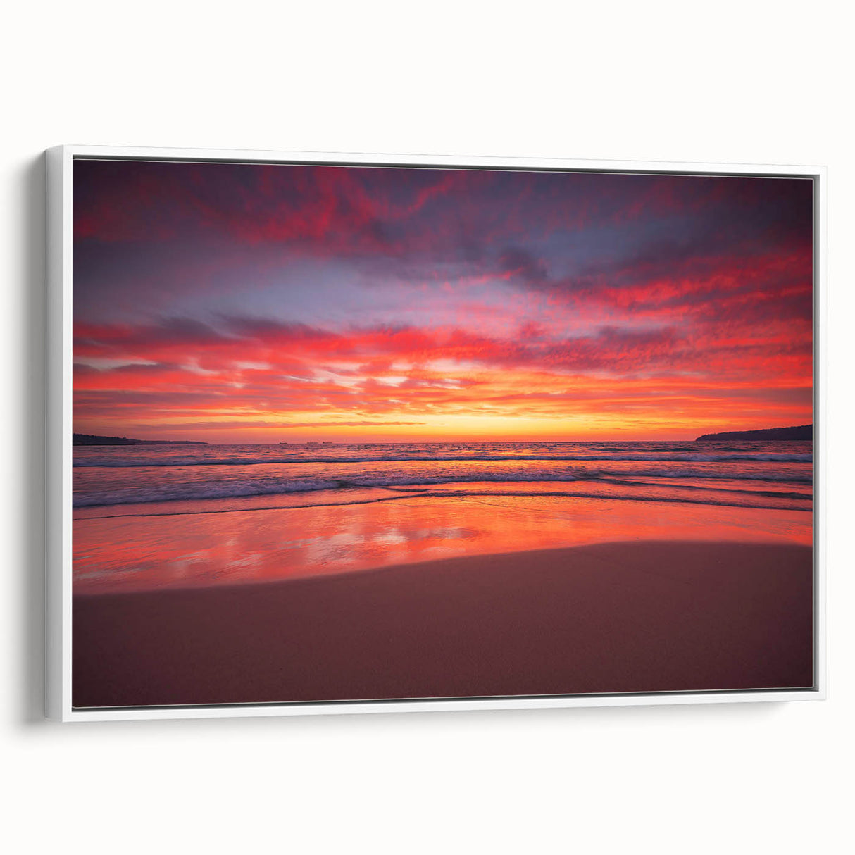 Framed canvas featuring a landscape art painting of the Caribbean, with vibrant ocean blues and lush greens.