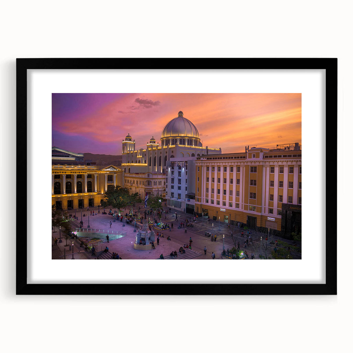 Abstract art print featuring vibrant, textured colors, framed in black, ideal for living room decor.