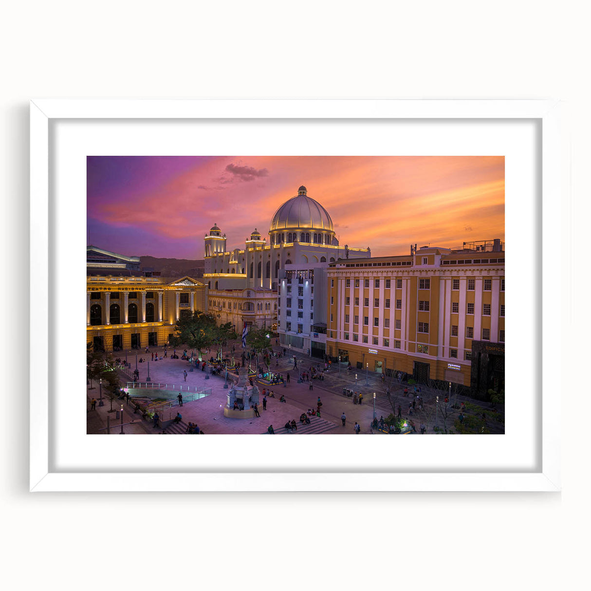 Abstract art print of a Central American scenery in muted earth tones on a white framed mat, ideal for dining room decor.