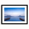 Abstract art print depicting vibrant, colorful Central American scenery on a large textured canvas, framed in black.