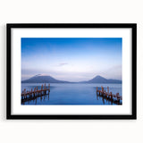 Abstract art print depicting vibrant, colorful Central American scenery on a large textured canvas, framed in black.