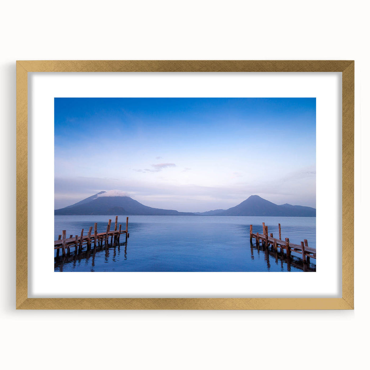 Extra large abstract art print of a textured Nicaraguan landscape in gold frame, ideal for living room decor.