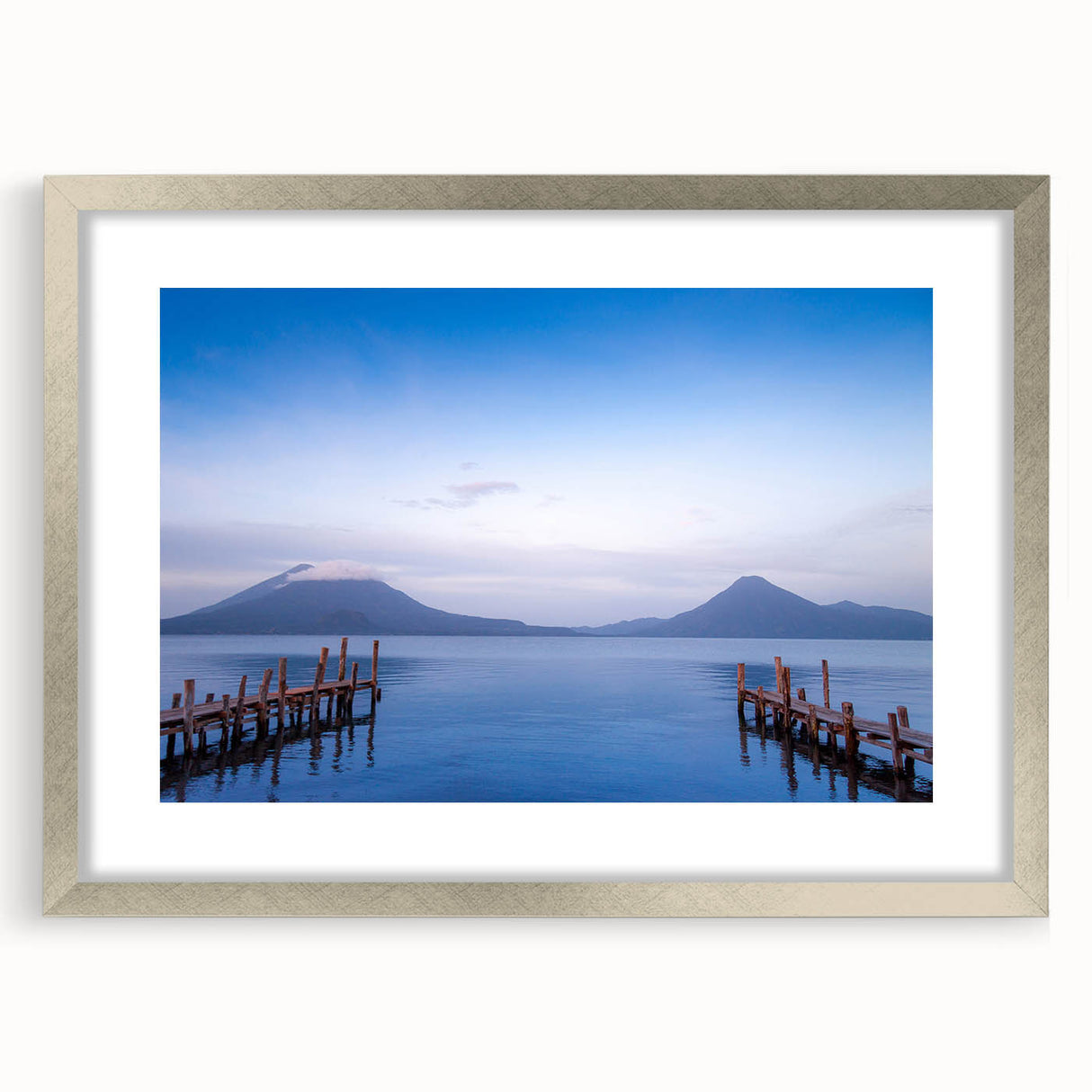 Textured abstract art print depicting the Central American scenery in muted earth tones, framed in silver.