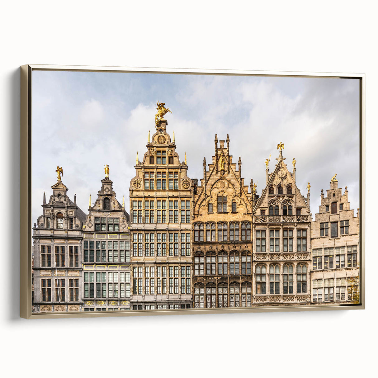 Framed canvas featuring a vintage-style landscape painting of a Belgian scenery in muted gold and black tones.