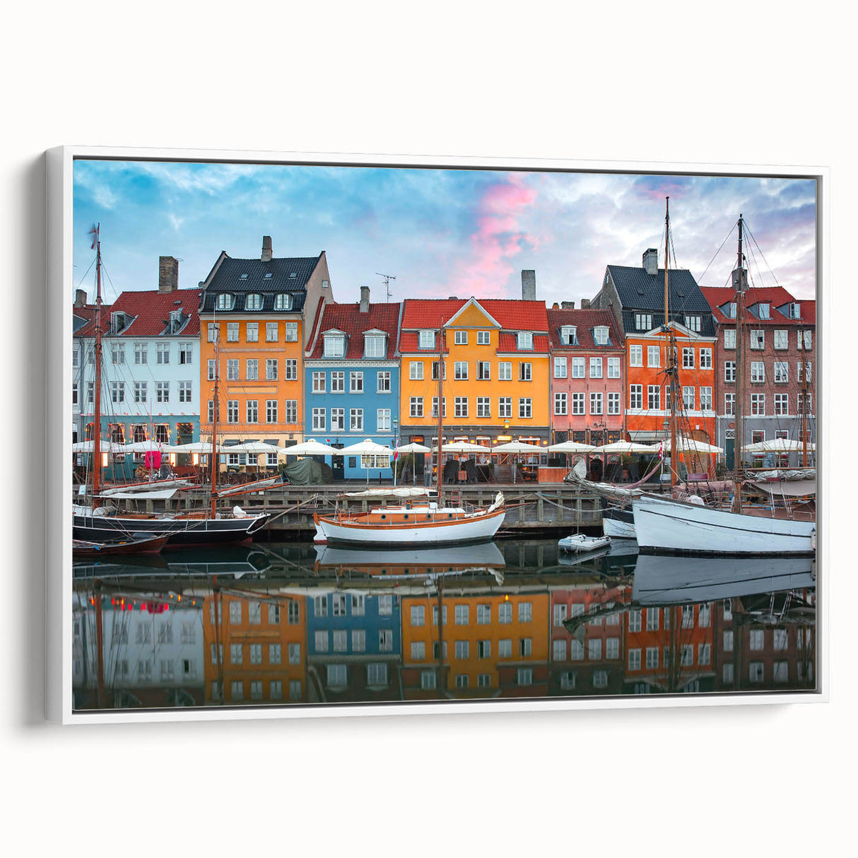 Vintage poster art of a colorful European cityscape on extra large framed canvas, ideal for living room decor.