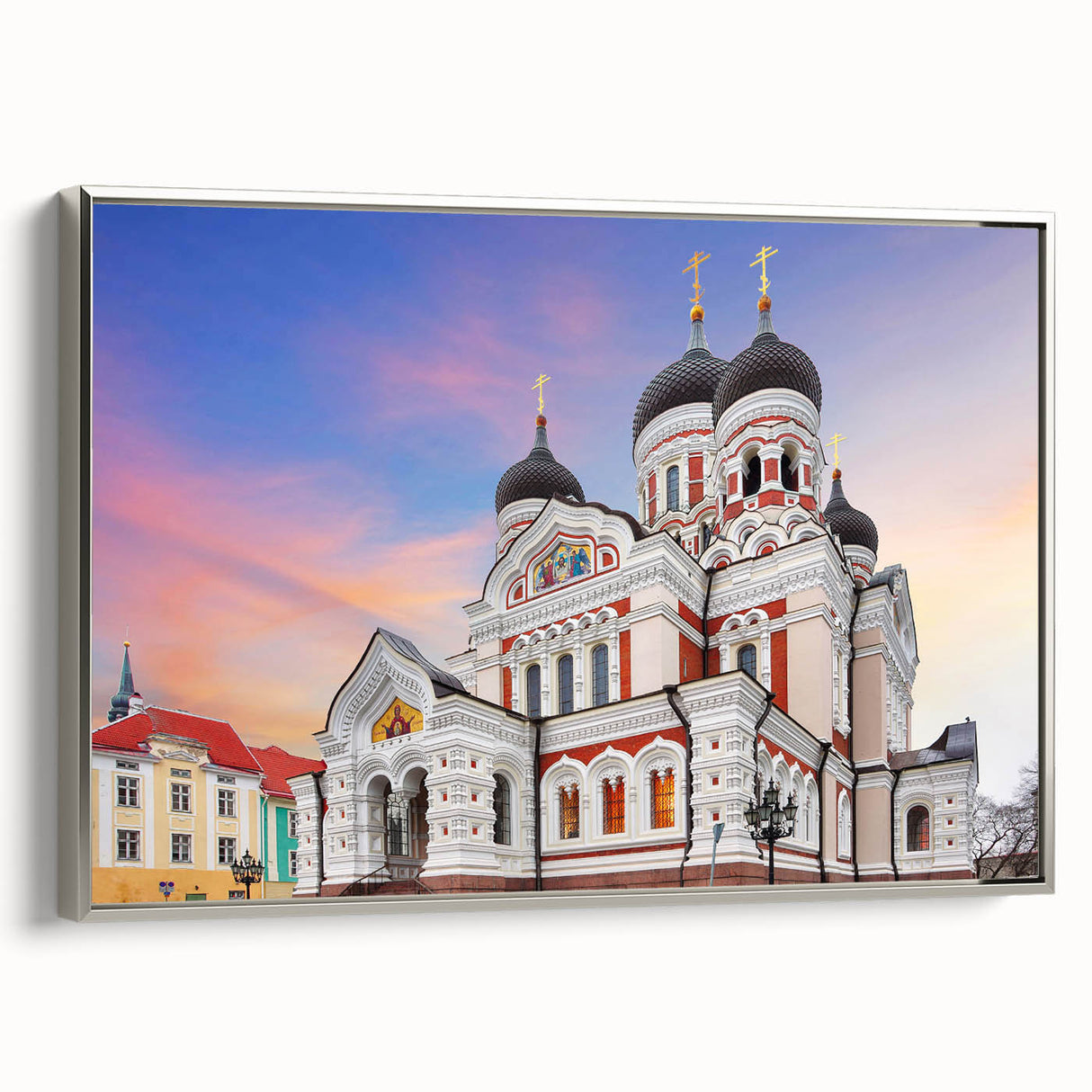 Landscape art painting of a European scenery, displayed on a framed canvas with silver edges.