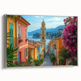 Framed canvas depicting a vintage-style landscape of Nice, France, featuring colorful art in pastel shades.
