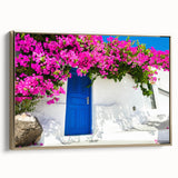 Framed canvas of Santorini landscape with muted blues and whites, ideal for bedroom wall art.