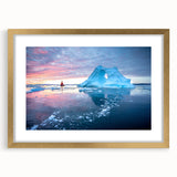Abstract art print of a Greenland landscape in muted green and blue tones, framed in gold, suitable for dining room decor.