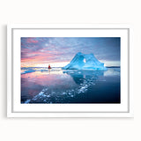Textured abstract art print depicting a serene Greenland landscape in muted green and blue tones, framed with a white mat.