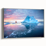 Framed canvas featuring a vintage-style landscape painting of Greenland, with muted green and black tones.