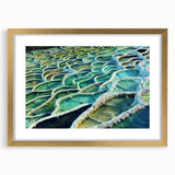 Abstract art print of a European cityscape in muted gray and gold tones, framed in gold, ideal for dining room decor.