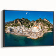 Black and white framed canvas of the Amalfi Coast landscape, ideal for bedroom wall decor.