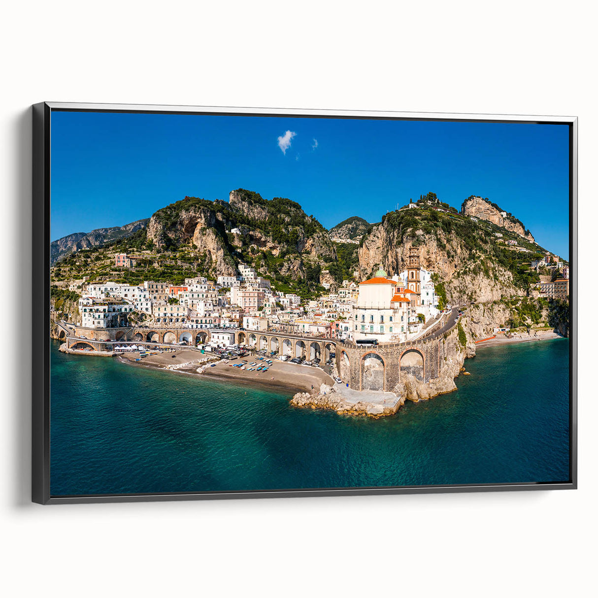 Black and white framed canvas of the Amalfi Coast landscape, ideal for bedroom wall decor.