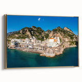 Framed canvas depicting the Amalfi Coast with vintage poster art style in muted gold and black tones.