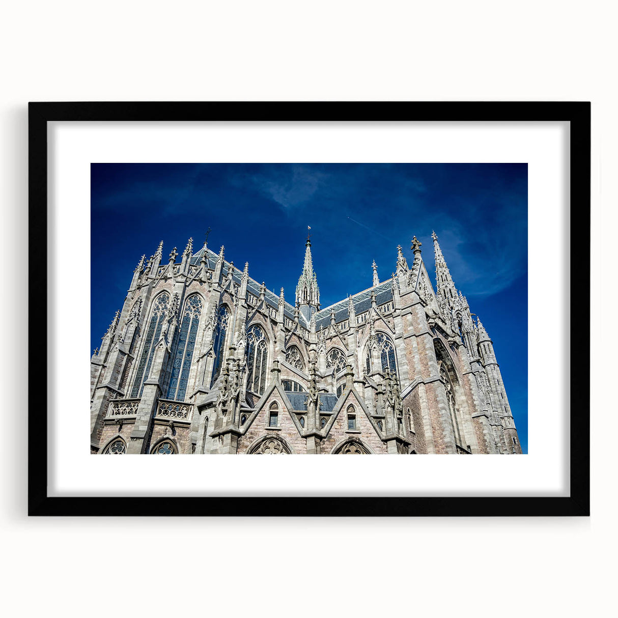 Extra large, textured abstract art print of colorful Milan scenery on a black framed canvas, ideal for living room decor.