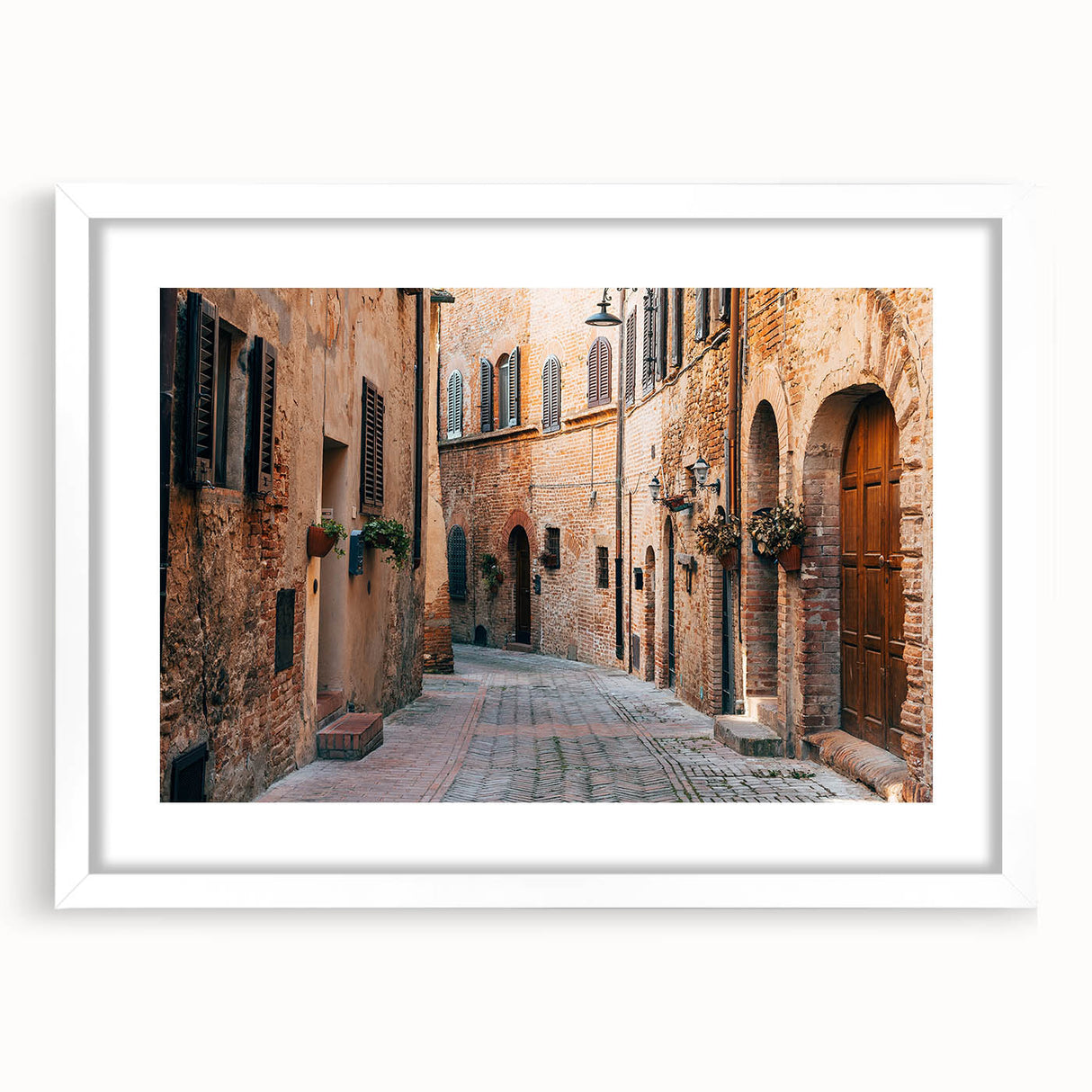 Textured art depicting a serene Tuscan landscape in soft earth tones on a framed white matte canvas.