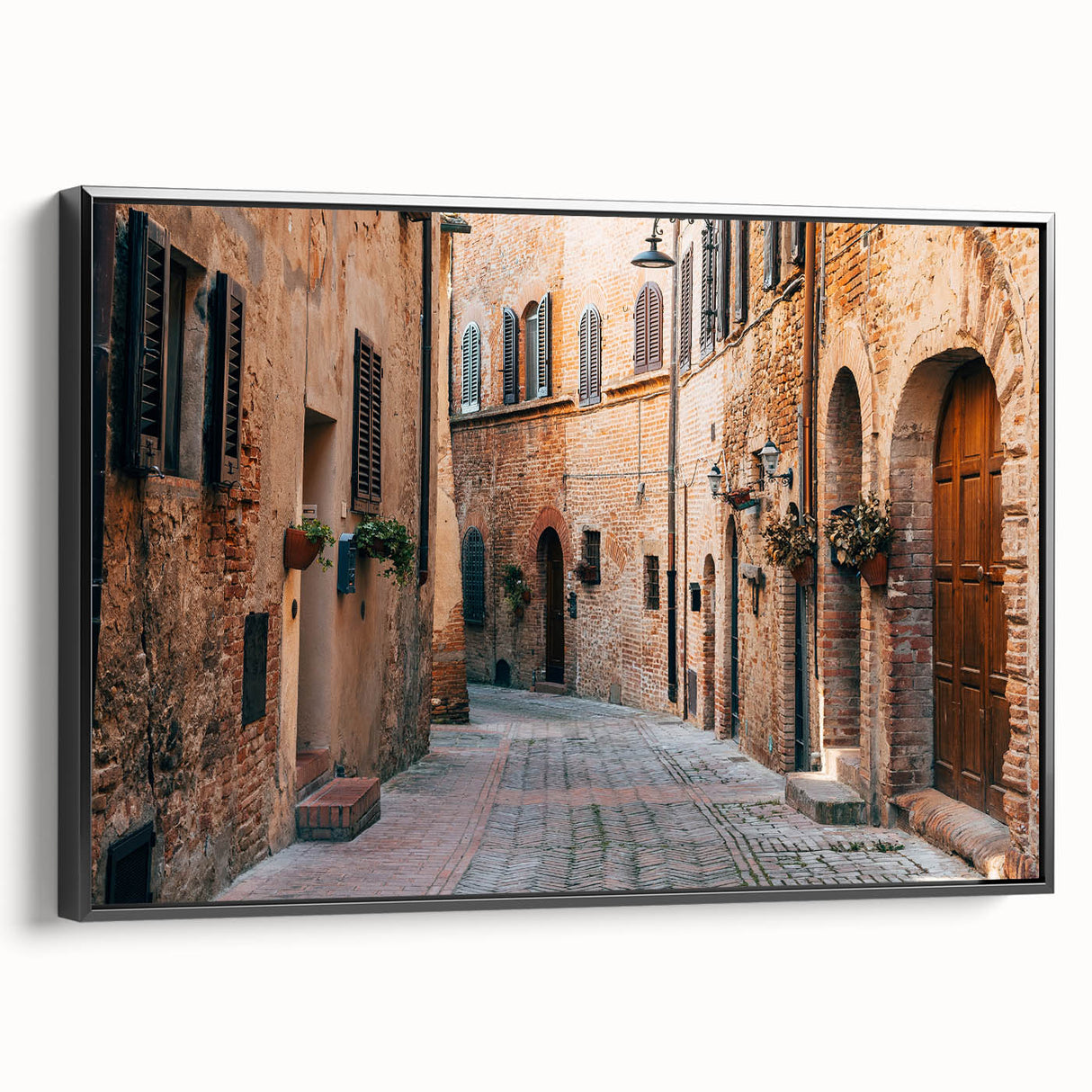 Black and white framed canvas of a Tuscan landscape, featuring rolling hills and sparse trees, ideal for bedroom wall decor.