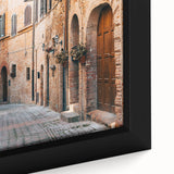 Textured black wall art depicting a vibrant Tuscan landscape on a framed canvas, ideal for living room decor.