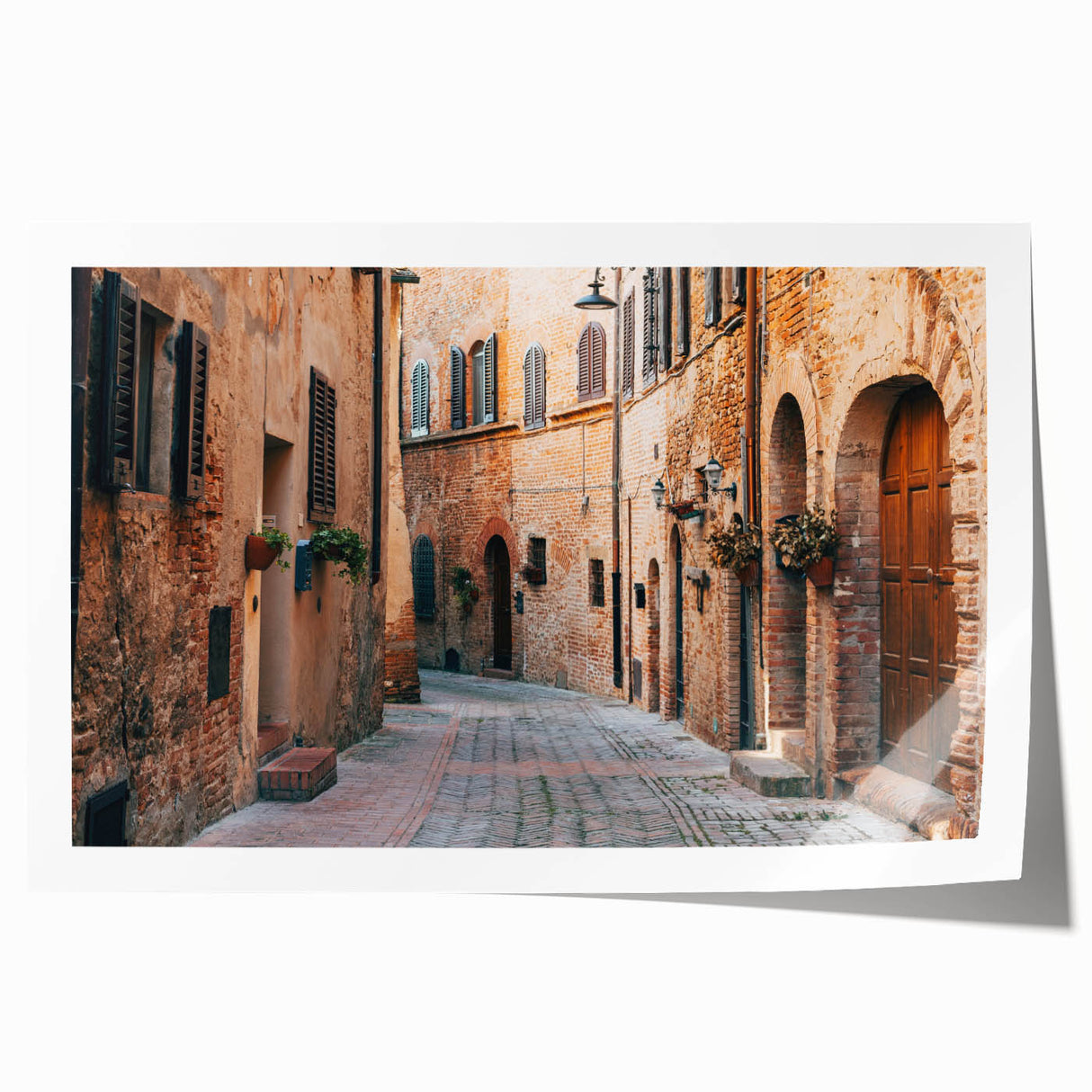 Rolled print of Tuscany landscape with vibrant green fields under a blue sky, ideal for dining room wall art.