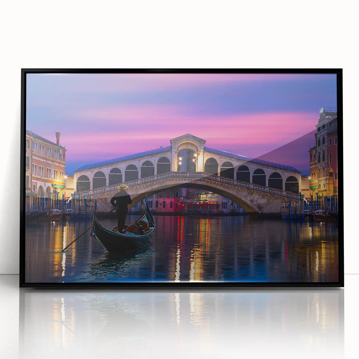 Large abstract wall art depicting a Venetian scenery in muted earth tones on a black framed acrylic.