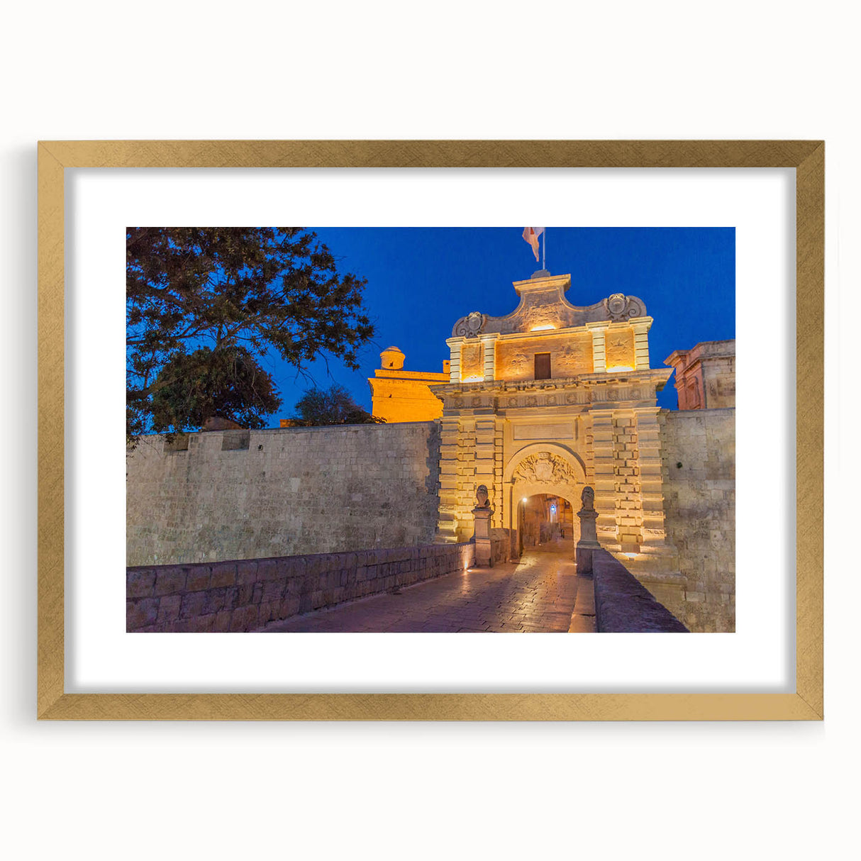 Abstract art print of a European Malta scenery in muted earth tones on a gold-framed canvas, suitable for dining room decor.